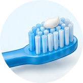 Brosse à dents avec un petit pois de dentifrice