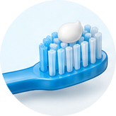 Brosse à dents avec un petit pois de dentifrice